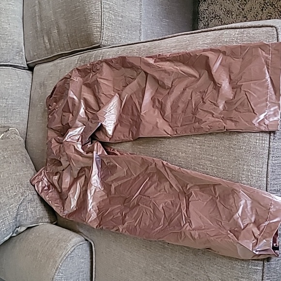 Pants they are brand new, rose color with stripes down the side. - Picture 3 of 10